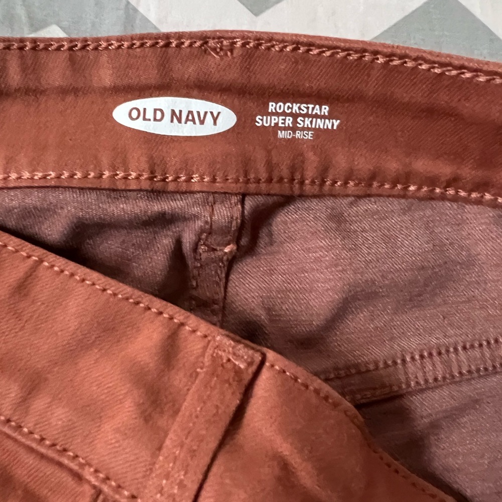 Rust colored skinny leg pants